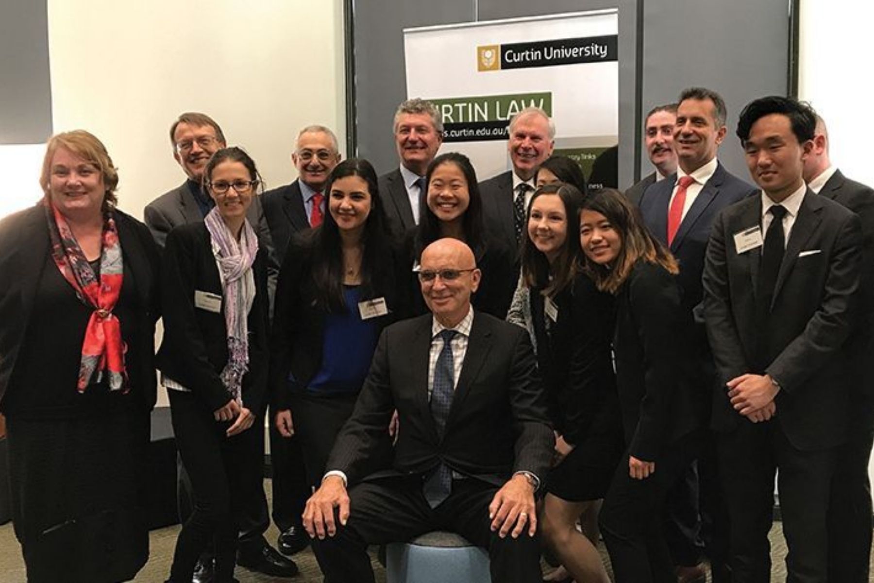 Photo of Small Business Commissioner David Eaton, Minister for Small Business Paul Papalia CSC and the Attorney General John Quigley with students from the John Curtin Law Clinic.