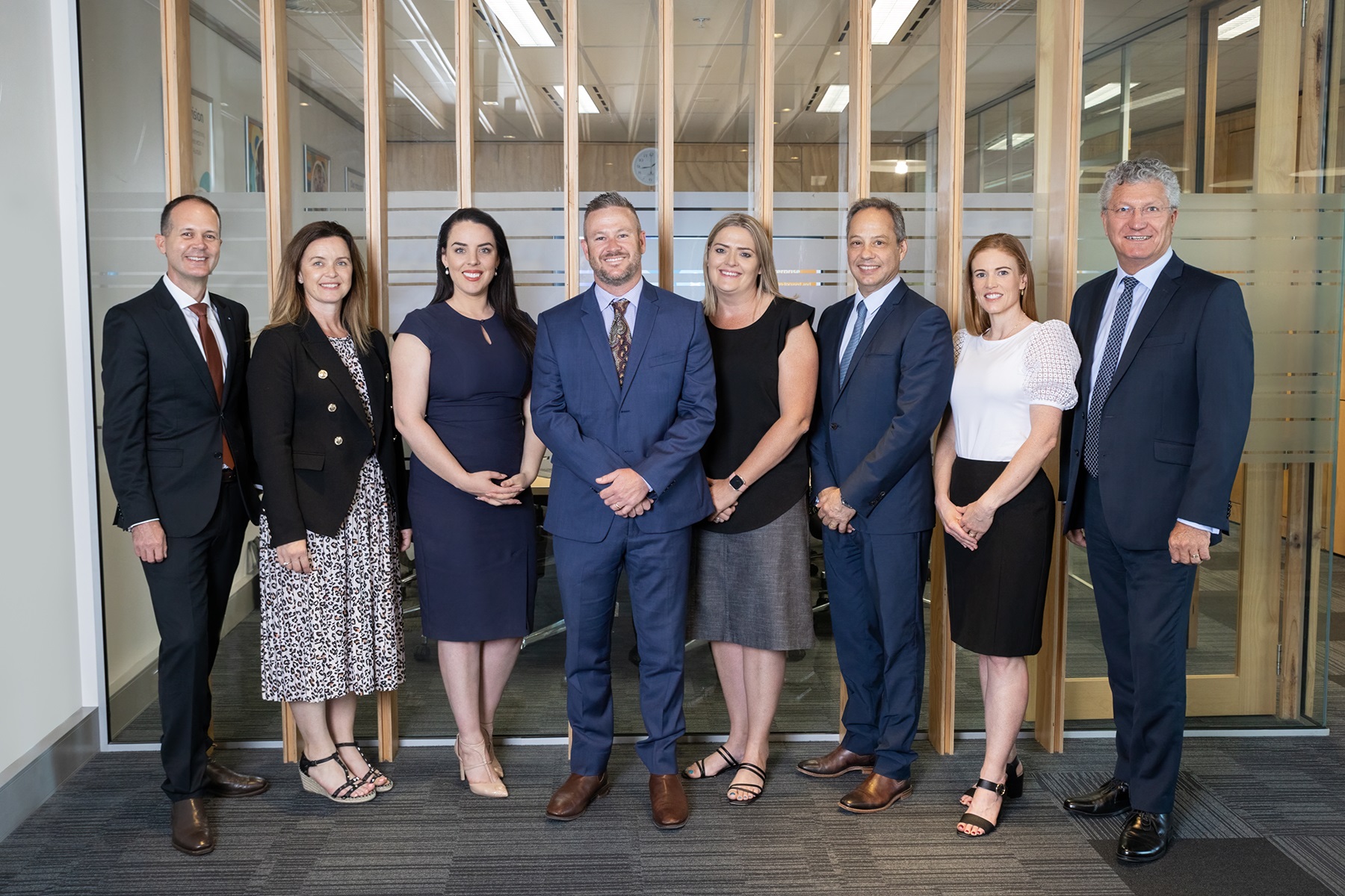 Photo of the SBDC Board (L-R): Grant Cucel, Danelle Cross, Eliza Carbines, Steven Dobson, Gillian Nathan, Anthony Masi, and Cindy Hurst with WA Small Business Commissioner David Eaton.